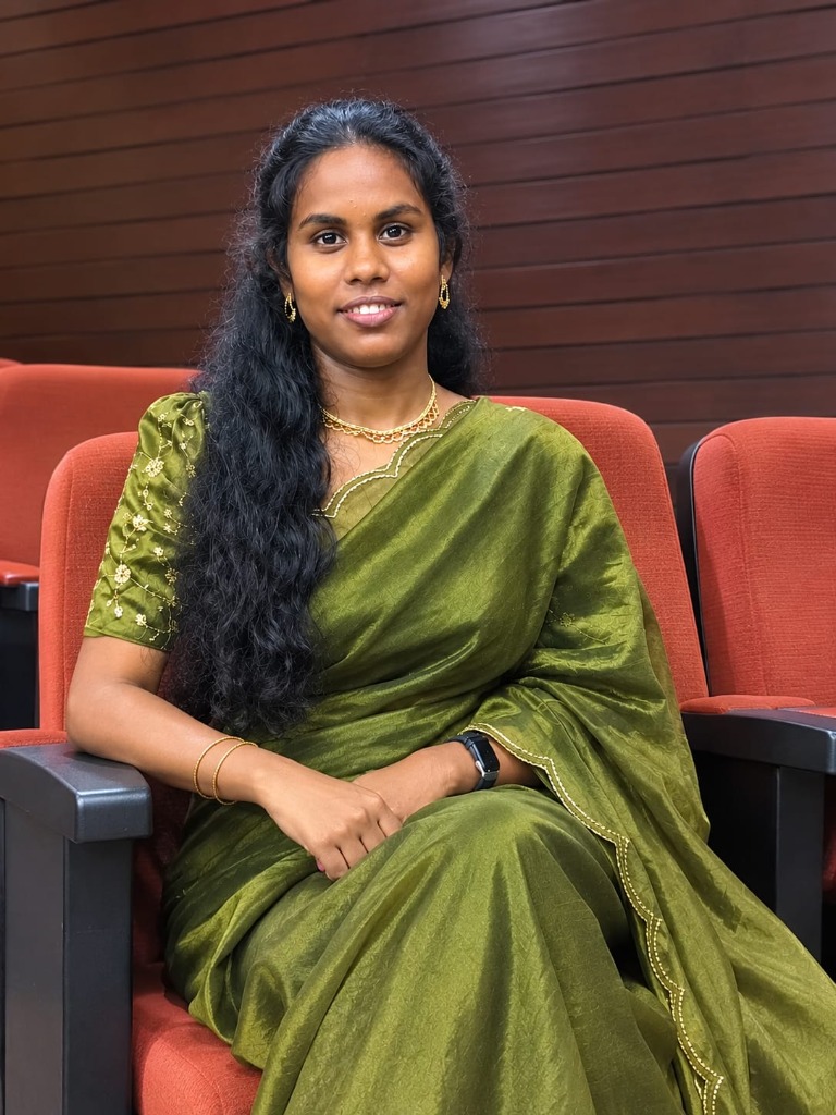 Banu S - Elegant Portrait in Emerald Green Saree